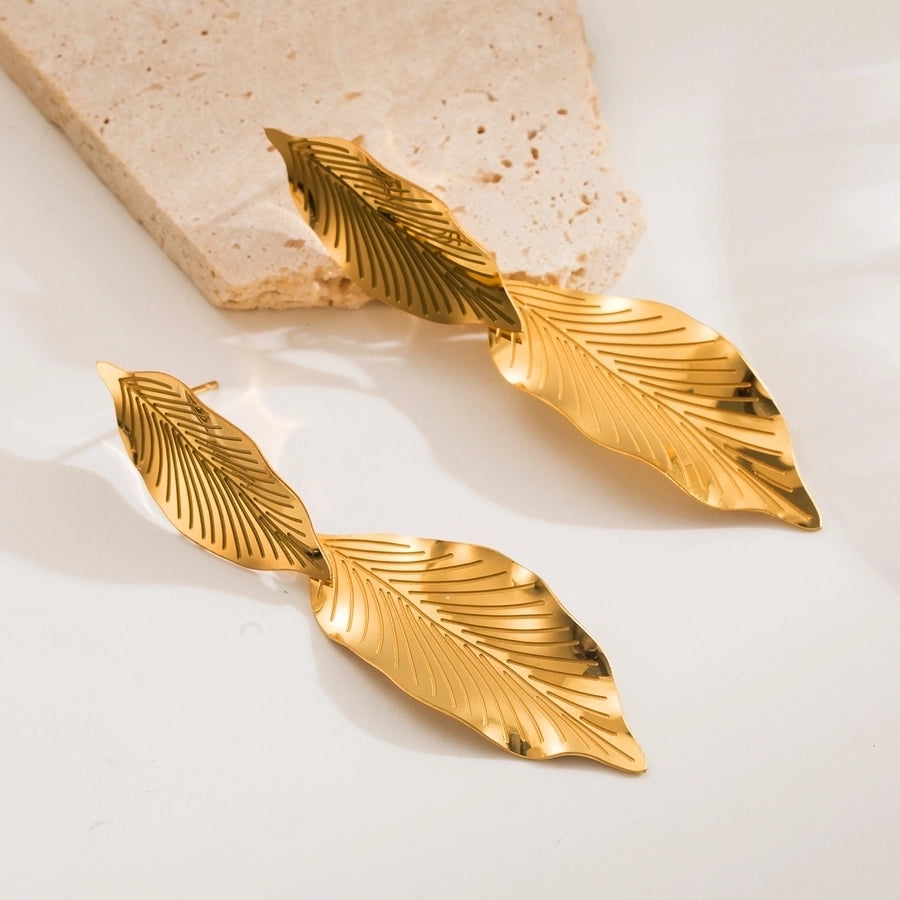 Elegant Golden Leaf & Drop Earrings - Statement Jewelry Set lavixi 2024 2025